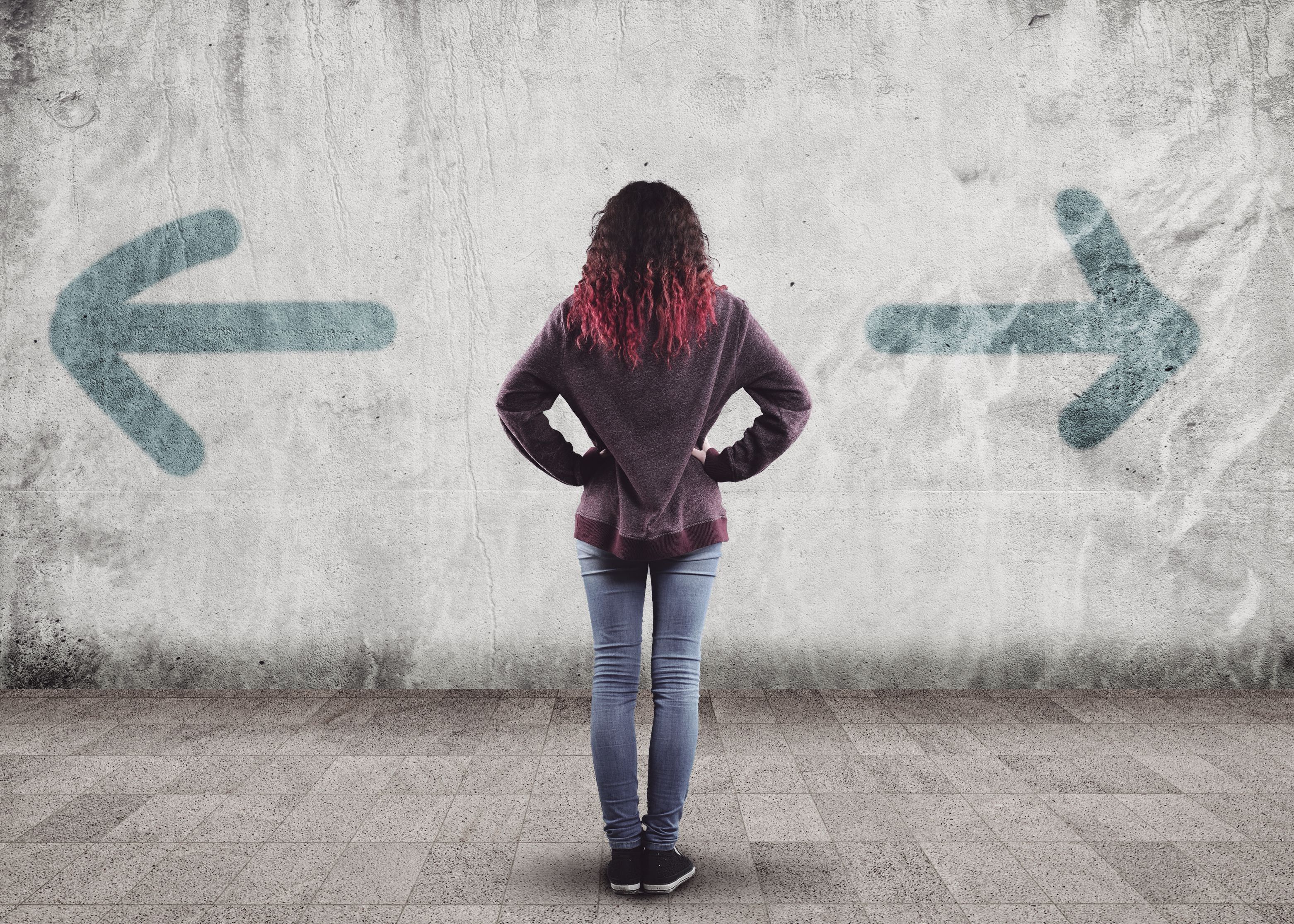 Woman contemplating difficult marriage decision during virtual coaching session - online should I stay or go relationship coaching available nationwide